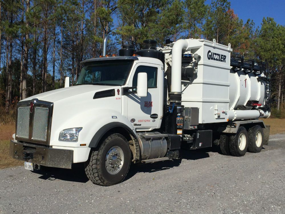 H&M vacuum truck staged for industrial service work
